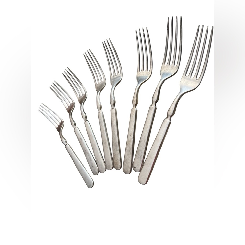8~ Antique M.L. Walker silver plated forks.